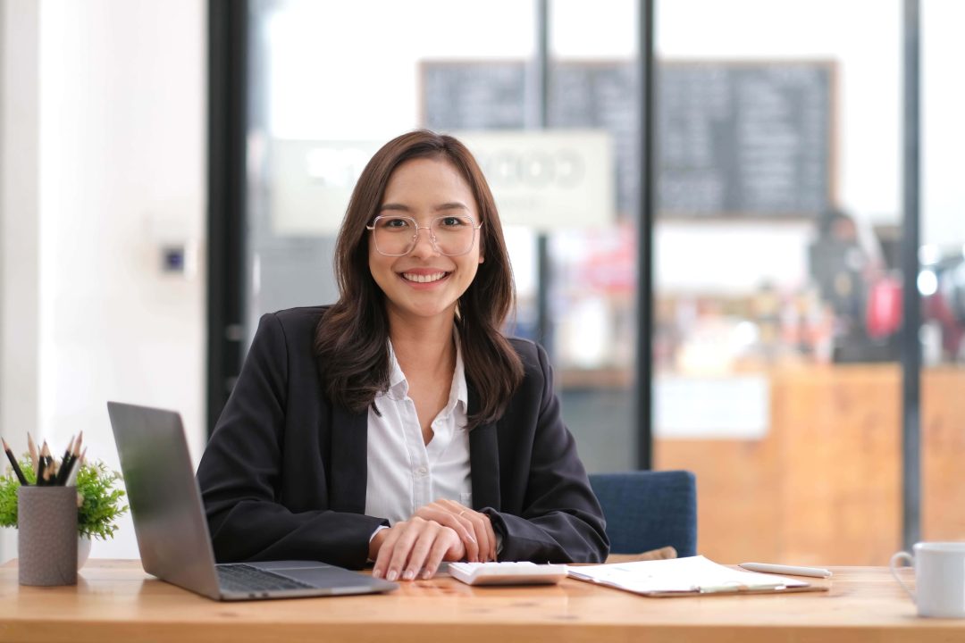 portrait-of-smiling-beautiful-business-asian-woman-2022-10-10-20-22-55-utc
